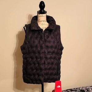 NWT Black puffy sleeveless NorthFace Jacket